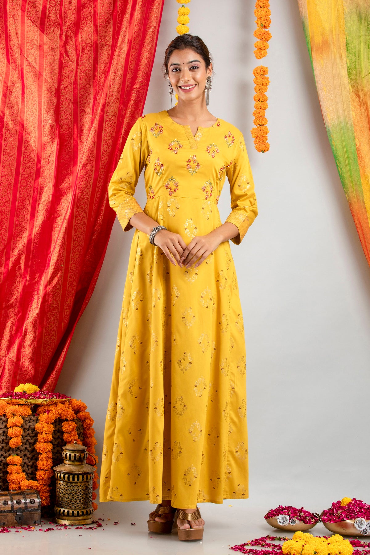 BEAUTIFUL GOLD PRINTED LONG DRESS EMBALISHED WITH ZARDOZI WORK
