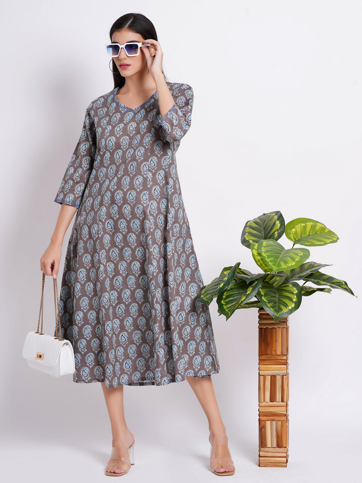 PRINTED FLAIRED KALIDAR LONG KURTI EMBELLISHED WITH HAND CRAFT