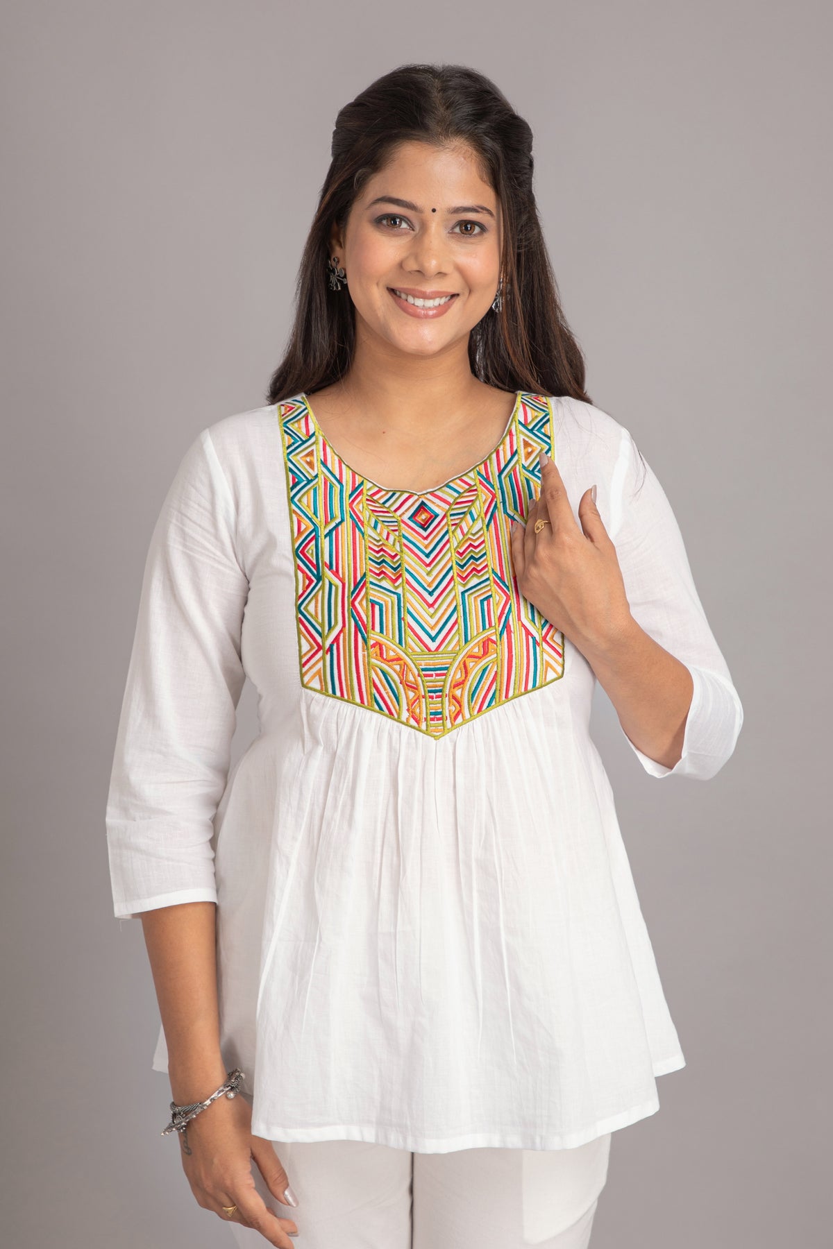 FLARED SHORT TOP WITH MULTICOLOR GEOMETRIC EMBROIDERY AT YOKE