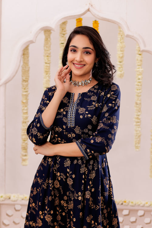 GOLD PRINTED FLAIRED DRESS WITH MIRROR EMBROIDERY DETAILS