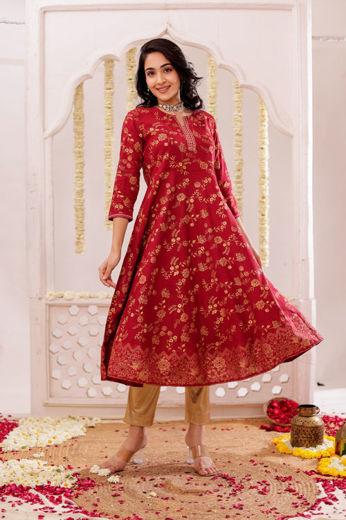 GOLD PRINTED FLAIRED DRESS WITH MIRROR EMBROIDERY DETAILS