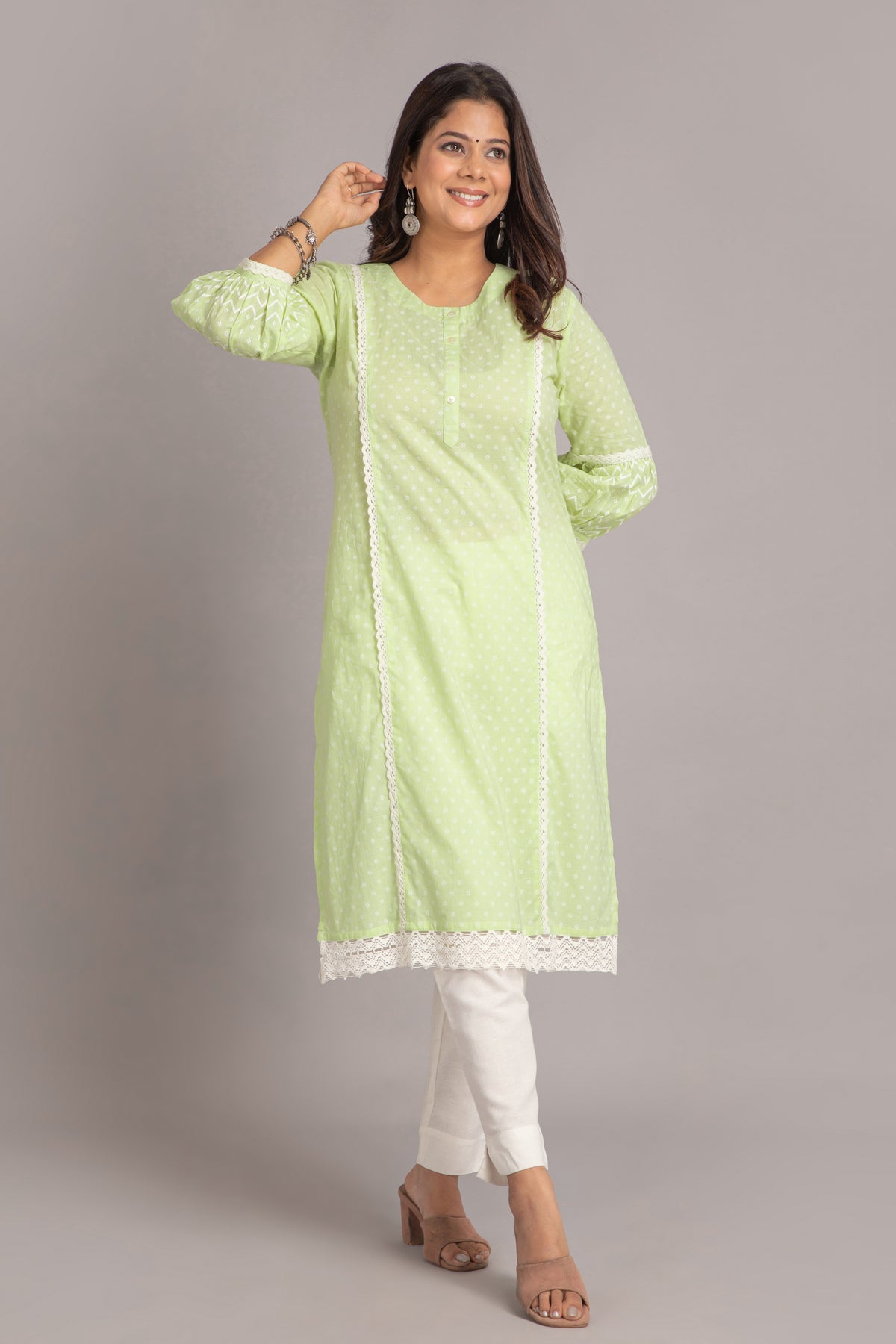 PRINTED MAL COTTON EMBELLISHEDWITH LACE DETAILED STRAIGHT KURTI