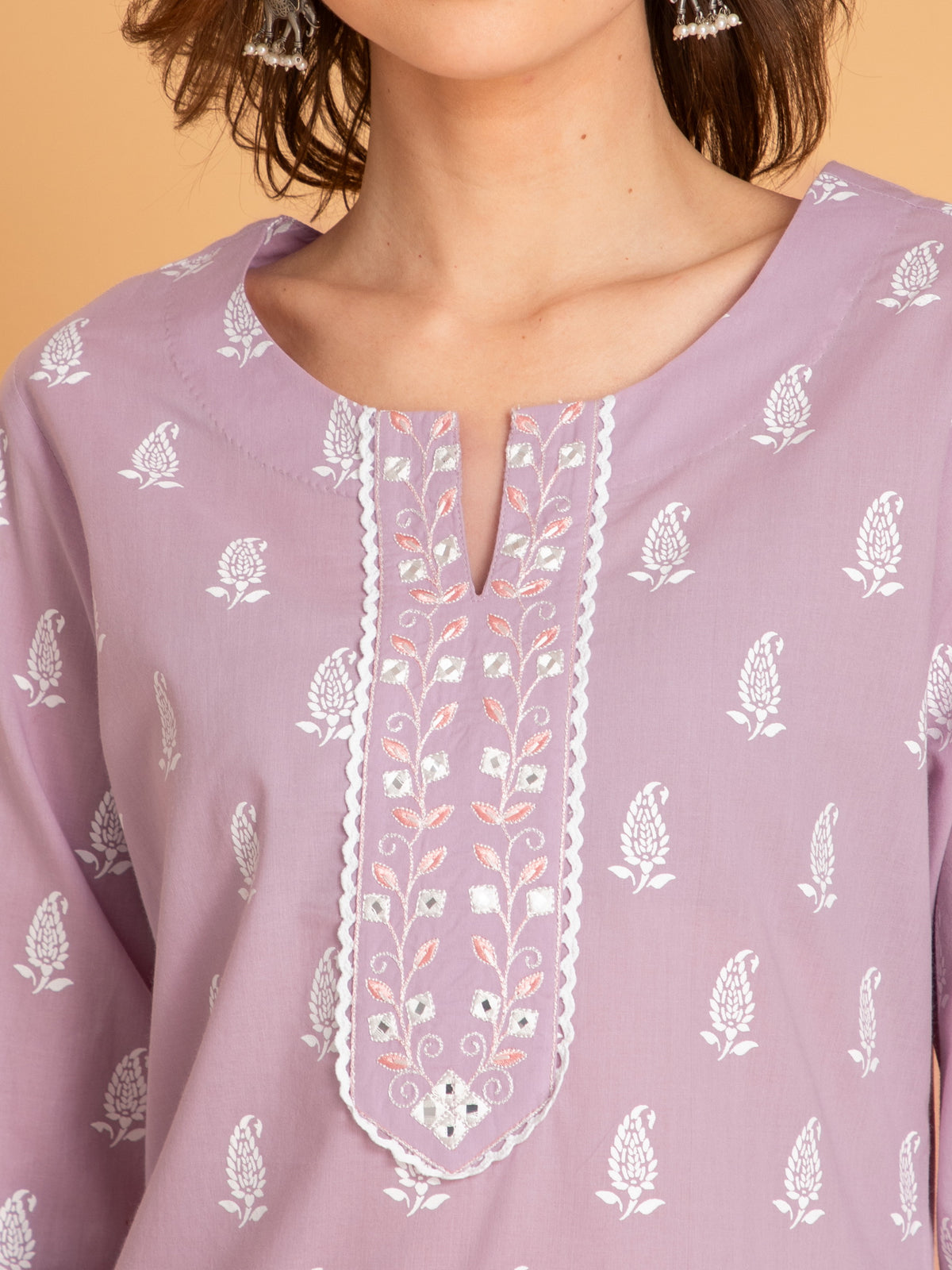 MUL COTTON PRINTED 3PCS. KURTA PANT SET EMBELLISHED WITH EMBROIDERY AND LACE DETAILS.