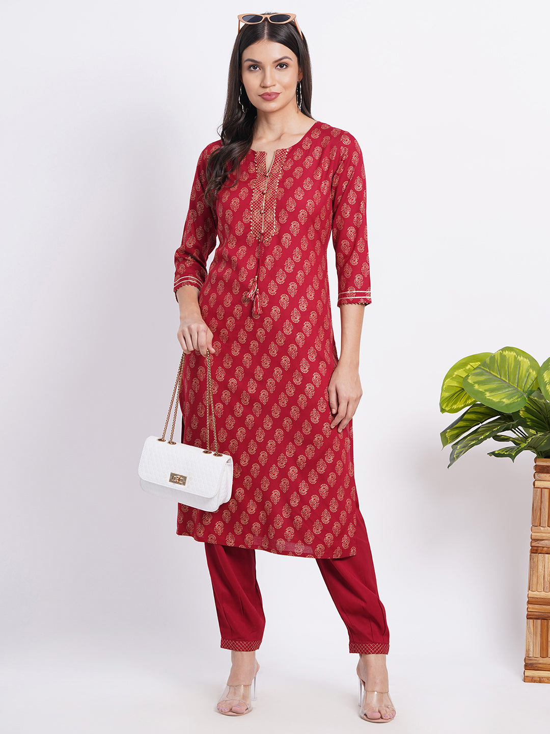 SUTI Women Elegant Gold Printed Kurta Set with Craft Button & Dori Tassels