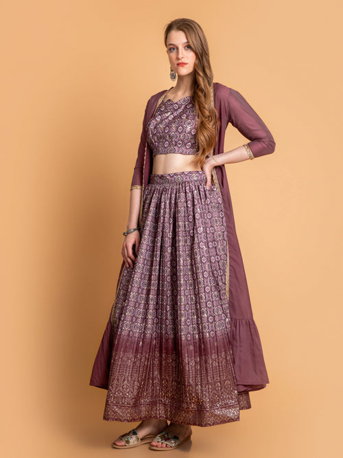 SUTI WOMEN CHANDERI BASE 3PC FUSION SKIRT SET PAIRED WITH LONG SHRUG EMBELIISHED WITH LACE DETAILS.