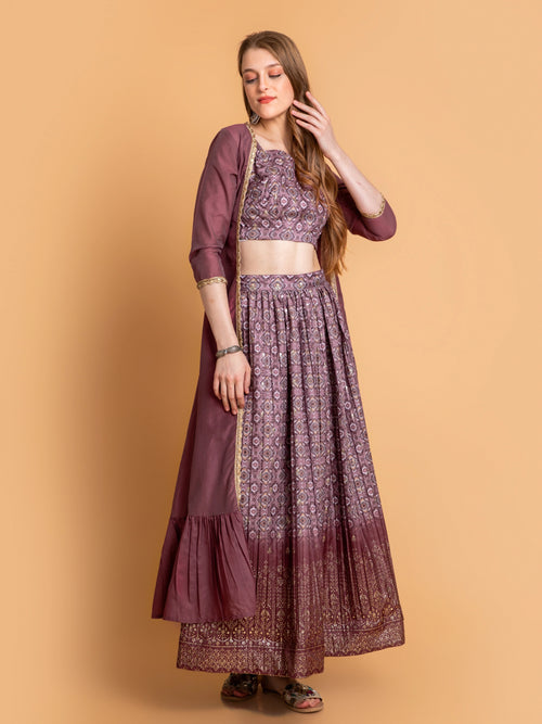 SUTI WOMEN CHANDERI BASE 3PC FUSION SKIRT SET PAIRED WITH LONG SHRUG EMBELIISHED WITH LACE DETAILS.