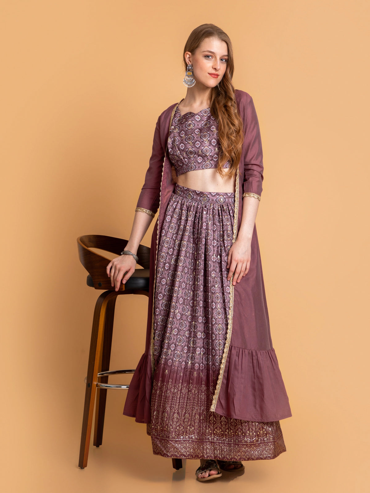 SUTI WOMEN CHANDERI BASE 3PC FUSION SKIRT SET PAIRED WITH LONG SHRUG EMBELIISHED WITH LACE DETAILS.