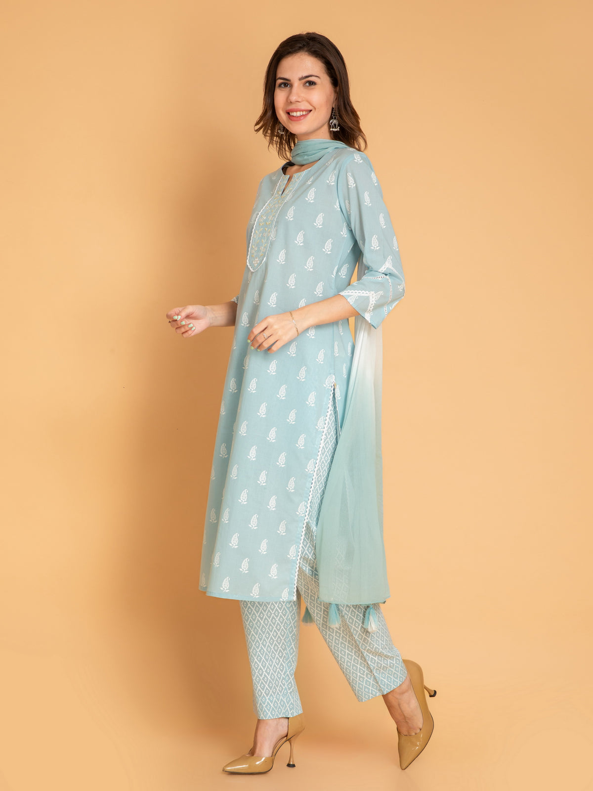 MUL COTTON PRINTED 3PCS. KURTA PANT SET EMBELLISHED WITH EMBROIDERY AND LACE DETAILS.