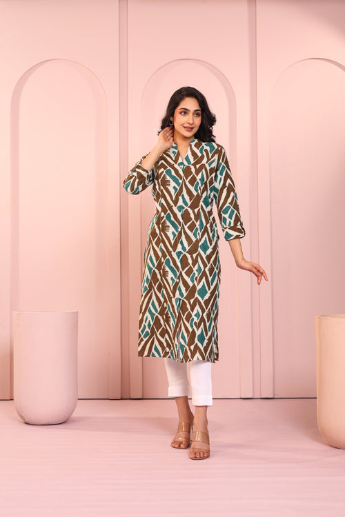 ABSTRACT PRINTED PRINCESS CUT LONG KURTI EMBELLISHED WITH HAND CRAFT DETAILS