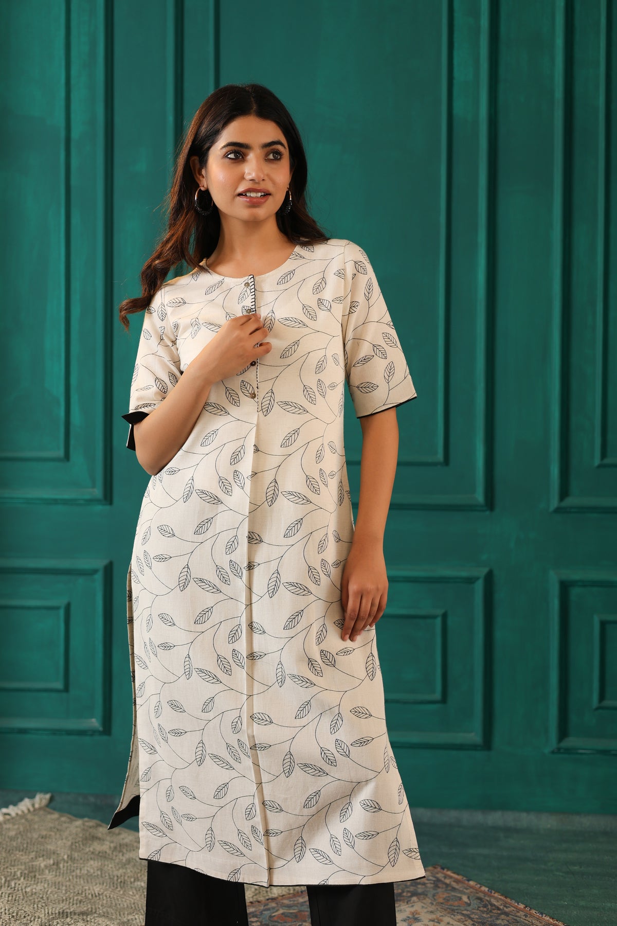 LINEN BLEND KHADI PRINTED KURTI EMBELLISHED WITH HAND CRAFT DETAILS