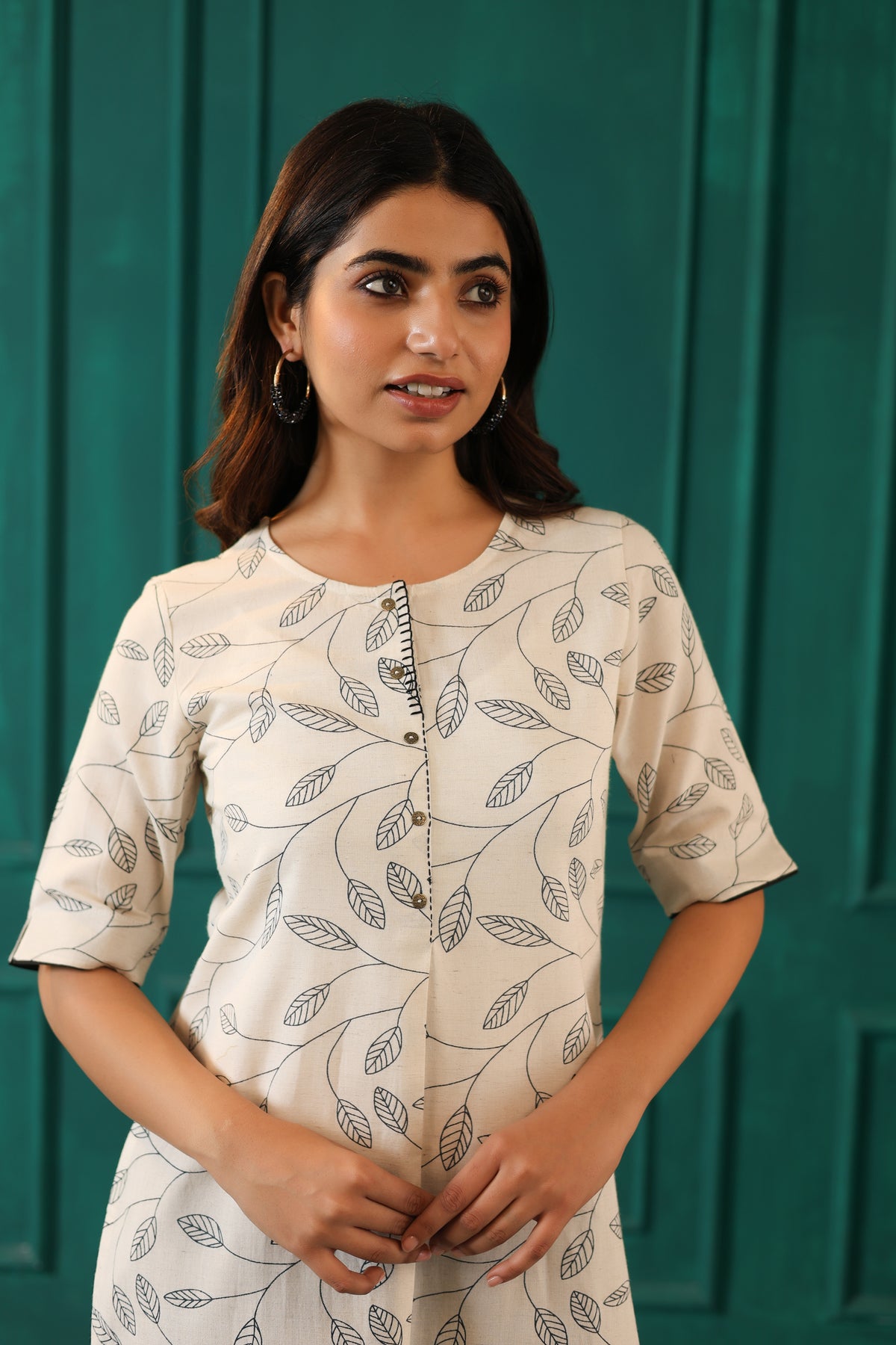 LINEN BLEND KHADI PRINTED KURTI EMBELLISHED WITH HAND CRAFT DETAILS