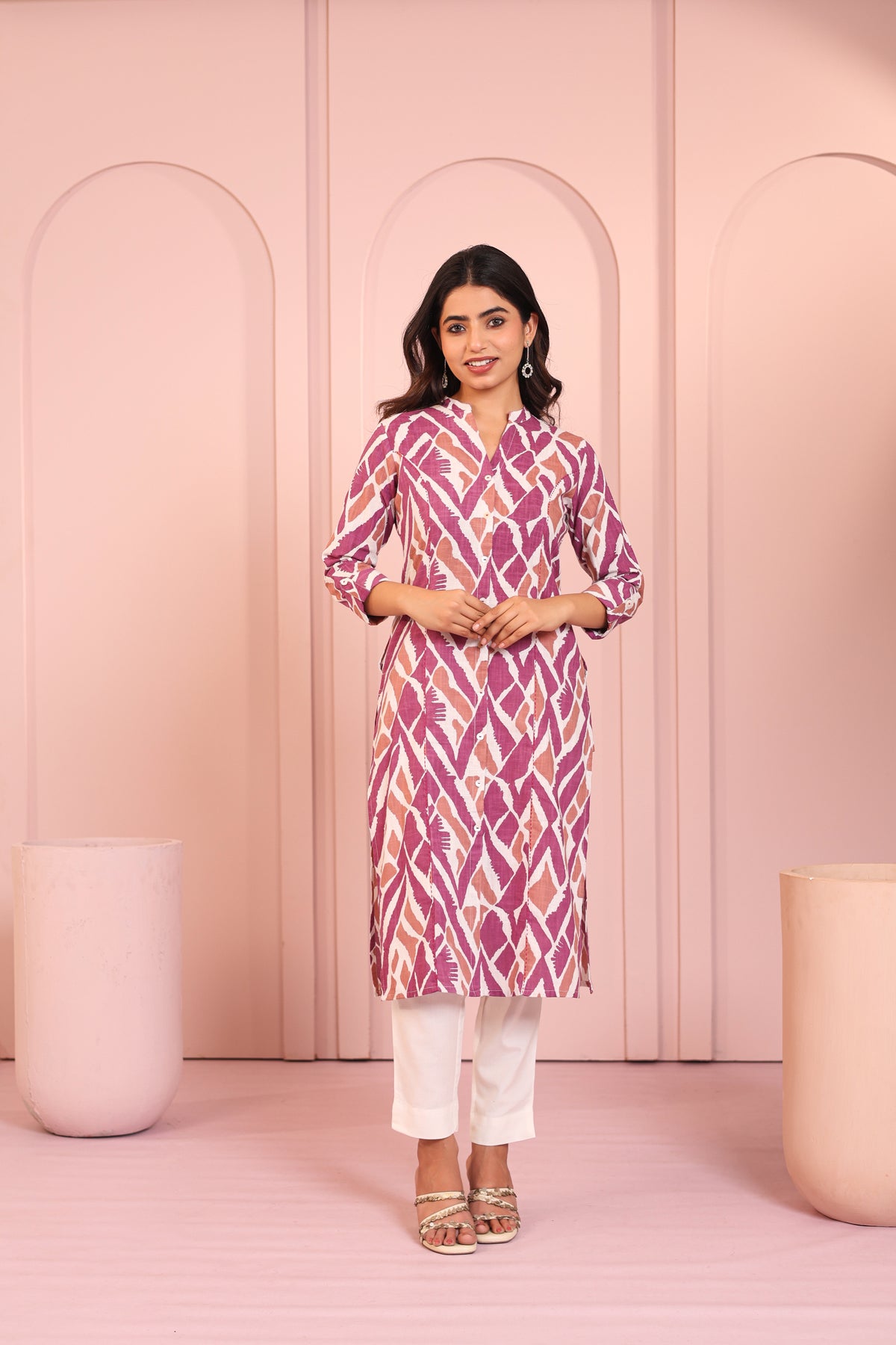 ABSTRACT PRINTED PRINCESS CUT LONG KURTI EMBELLISHED WITH HAND CRAFT DETAILS