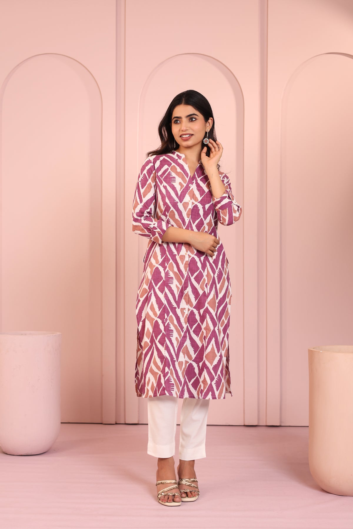 ABSTRACT PRINTED PRINCESS CUT LONG KURTI EMBELLISHED WITH HAND CRAFT DETAILS