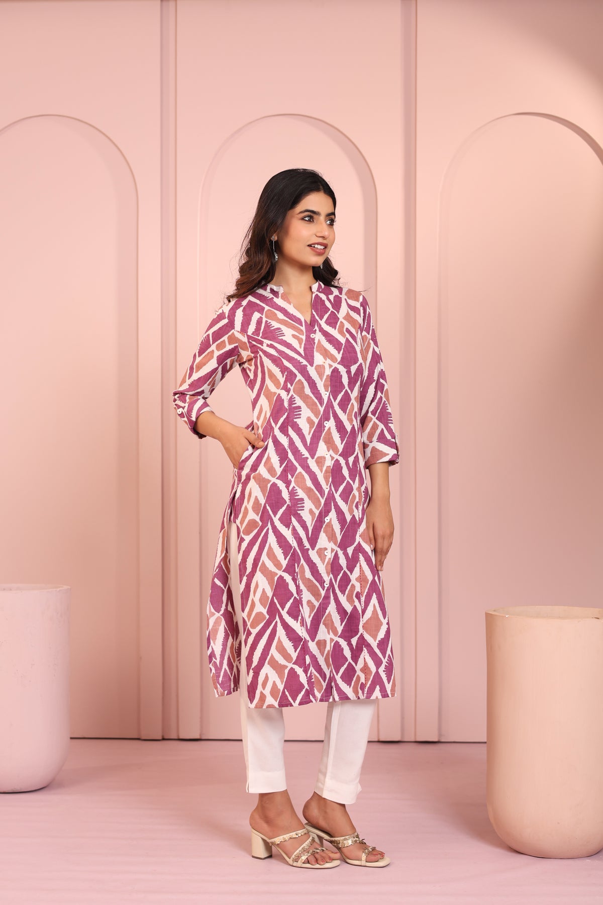 ABSTRACT PRINTED PRINCESS CUT LONG KURTI EMBELLISHED WITH HAND CRAFT DETAILS