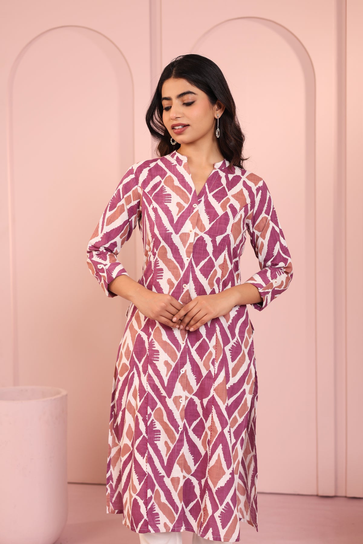 ABSTRACT PRINTED PRINCESS CUT LONG KURTI EMBELLISHED WITH HAND CRAFT DETAILS