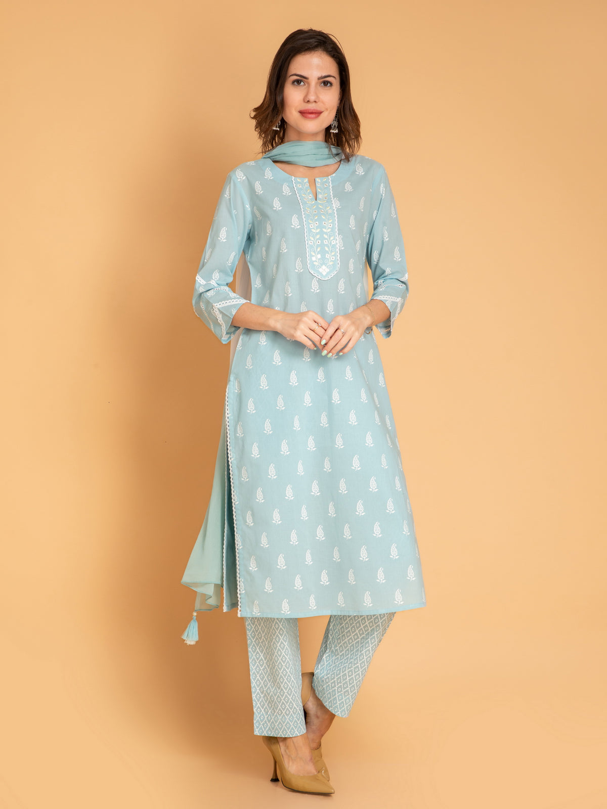 MUL COTTON PRINTED 3PCS. KURTA PANT SET EMBELLISHED WITH EMBROIDERY AND LACE DETAILS.