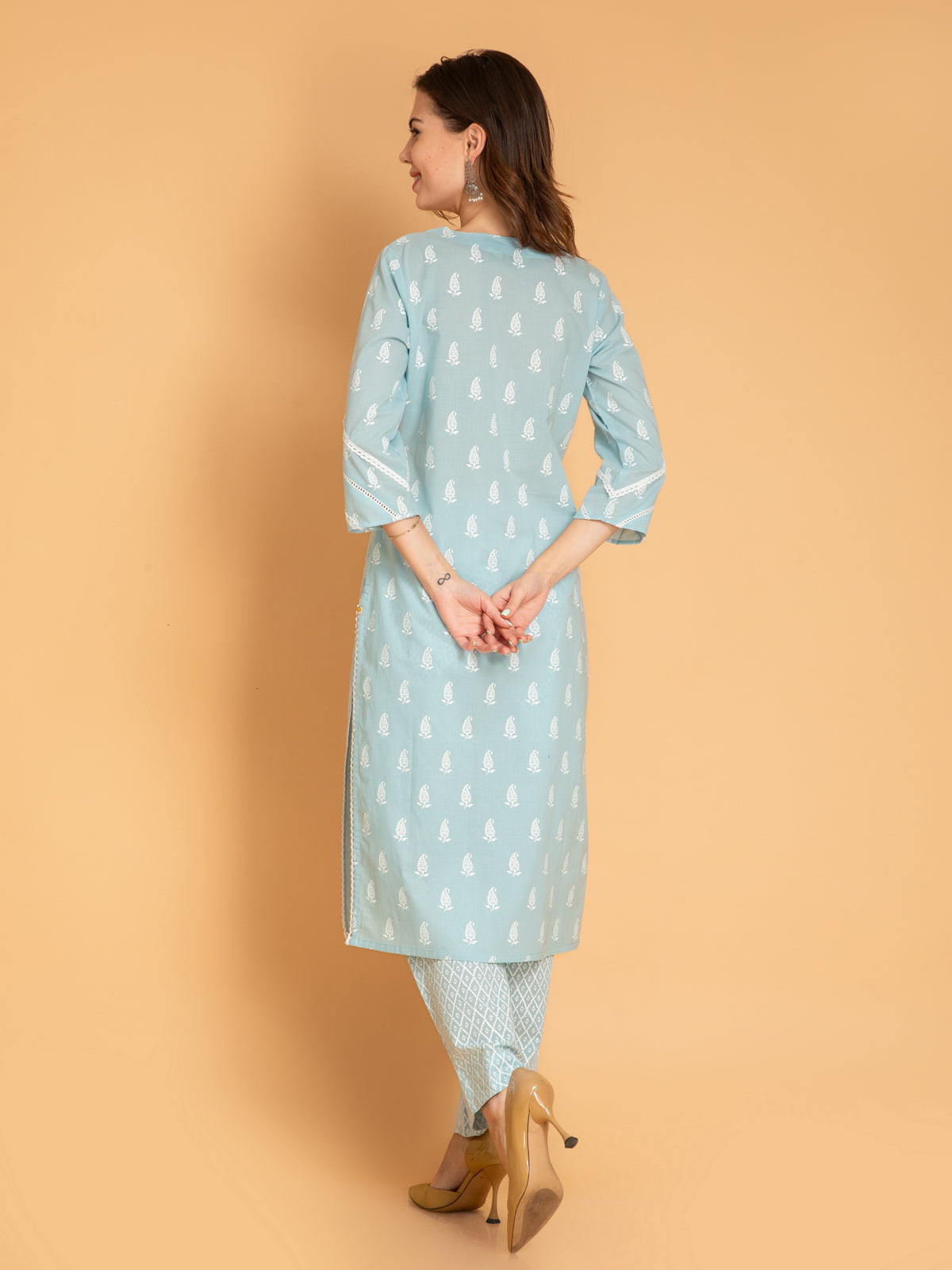 MUL COTTON PRINTED 3PCS. KURTA PANT SET EMBELLISHED WITH EMBROIDERY AND LACE DETAILS.